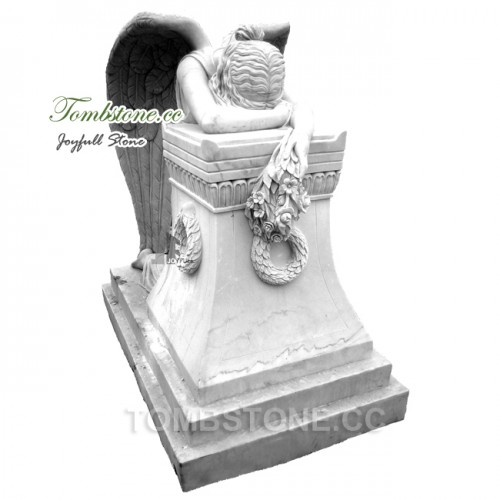 White marble angel headstone angel of grief weeping angel