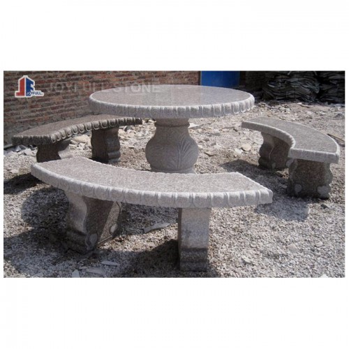 Large brown granite table set for home and garden
