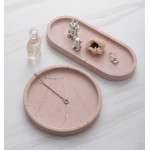 Interior decorative pink marble trays oval and round shape
