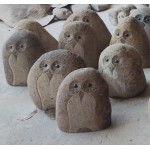 Medium size carved brown river stone owls